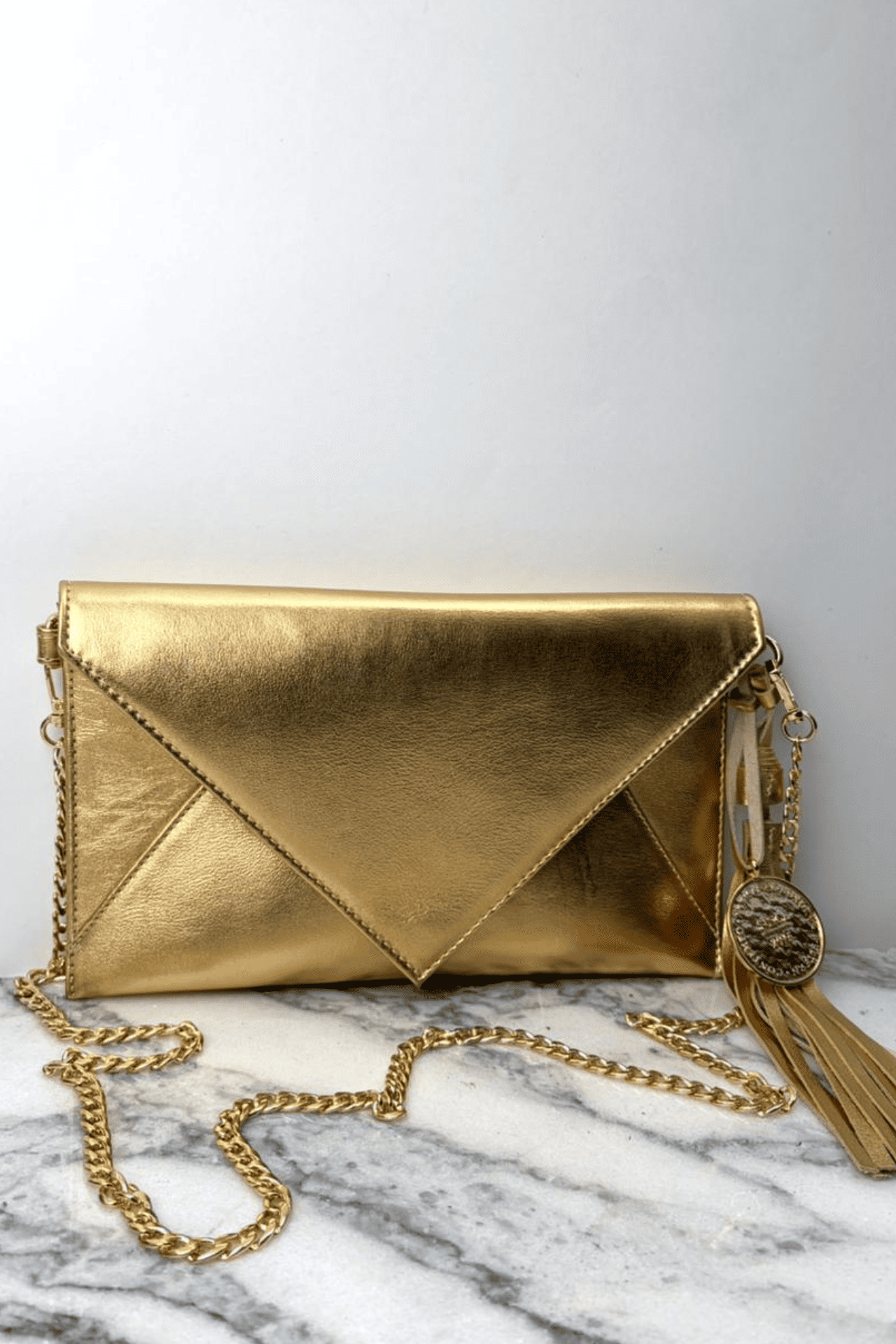 Icon Clutch - Oro