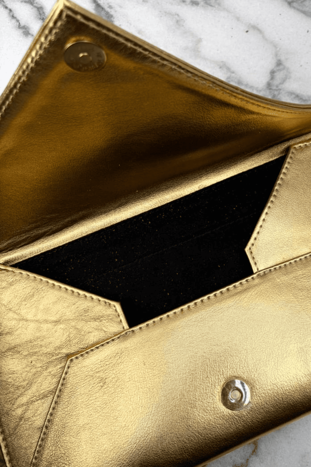 Icon Clutch - Oro